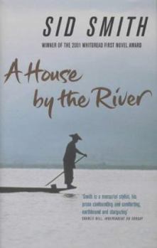 Paperback A House by the River Book