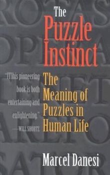Paperback The Puzzle Instinct: The Meaning of Puzzles in Human Life Book