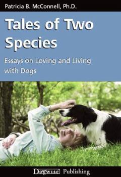 Paperback Tales of Two Species: Essays on Loving and Living with Dogs Book