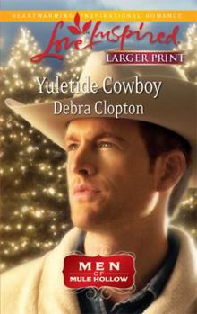 Mass Market Paperback Yuletide Cowboy [Large Print] Book