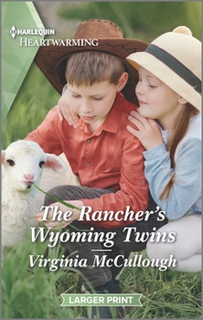 Mass Market Paperback The Rancher's Wyoming Twins: A Clean Romance [Large Print] Book