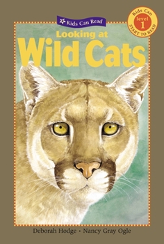 Paperback Looking at Wild Cats Book
