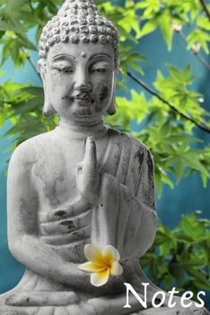 Paperback Notes: Beautiful Statue of Buddha in a Garden Setting Holding a Flower Book