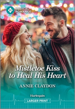 Mass Market Paperback Mistletoe Kiss to Heal His Heart [Large Print] Book