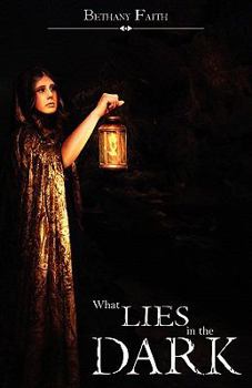 Paperback What Lies In The Dark Book