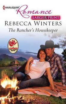 Mass Market Paperback The Rancher's Housekeeper [Large Print] Book