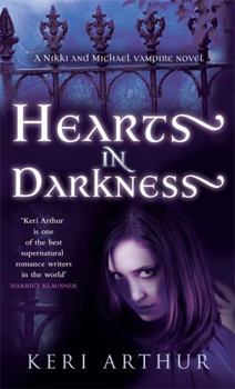 Paperback Hearts in Darkness Book