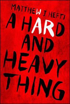 Paperback A Hard and Heavy Thing Book