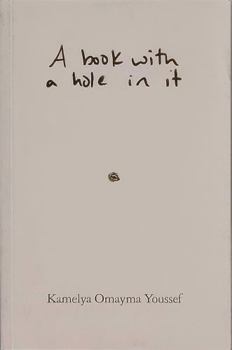 Paperback A book with a hole in it Book