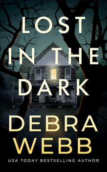 Paperback Lost in the Dark Book