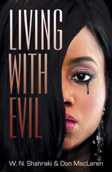 Paperback Living with Evil Book