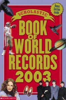 Paperback The Scholastic Book of World Records 2003 Book