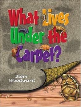 Paperback What Lives Under the Carpet? Book