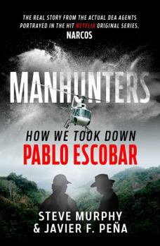 Paperback Manhunters Book