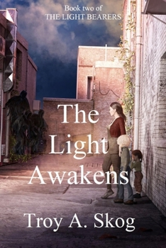 Paperback The Light Awakens Book