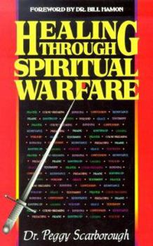 Paperback Healing Through Spiritual Warfare Book