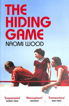 Paperback The Hiding Game Book