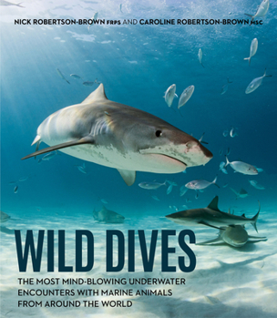 Hardcover Wild Dives: The Most Mind-Blowing Underwater Encounters with Marine Animals from Around the World Book
