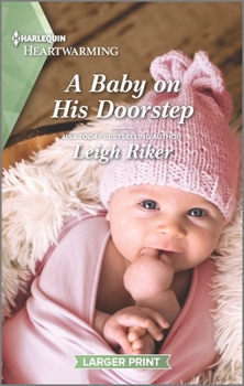 Mass Market Paperback A Baby on His Doorstep: A Clean and Uplifting Romance [Large Print] Book