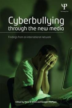 Paperback Cyberbullying through the New Media: Findings from an international network Book