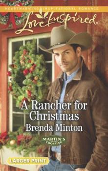 Mass Market Paperback A Rancher for Christmas [Large Print] Book