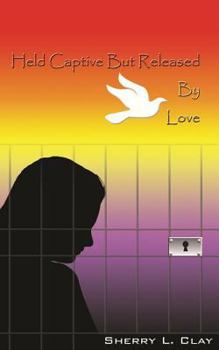 Paperback Held Captive But Released by Love Book