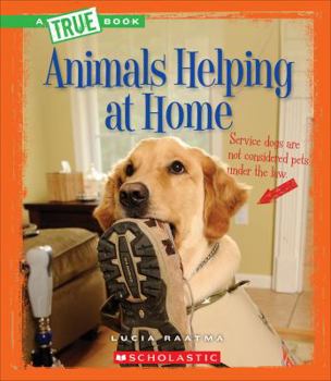 Hardcover Animals Helping at Home (a True Book: Animal Helpers) (Library Edition) Book