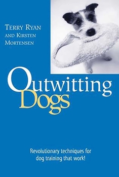 Paperback Outwitting Dogs Book