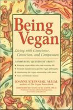 Paperback Being Vegan Book