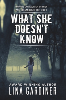 Paperback What She Doesn't Know Book