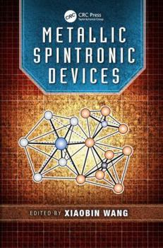 Paperback Metallic Spintronic Devices Book