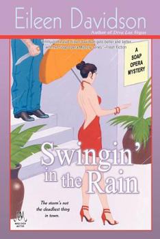 Paperback Swingin' In The Rain: A Soap Opera Mystery Book