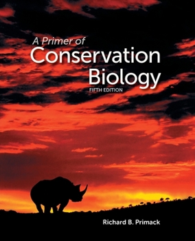 Paperback Primer of Conservation Biology (Revised) Book
