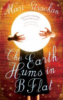 Paperback The Earth Hums in B Flat Book