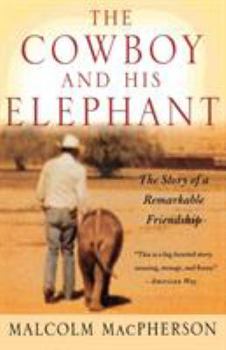 Paperback The Cowboy and His Elephant Book