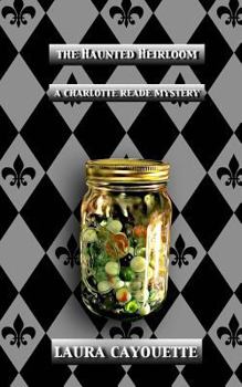 Paperback The Haunted Heirloom: A Charlotte Reade Mystery Book