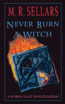 Paperback Never Burn a Witch: A Rowan Gant Investigation Book