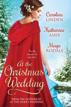 Paperback At the Christmas Wedding Book