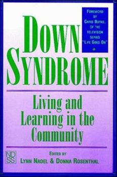 Paperback Down Syndrome: Living and Learning in the Community Book