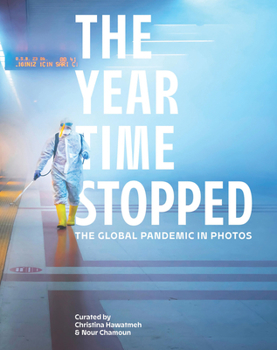 Hardcover The Year Time Stopped: The Global Pandemic in Photos Book