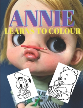 Paperback Annie learns to colour Book