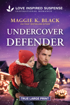 Paperback Undercover Defender [Large Print] Book