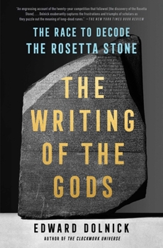 Paperback The Writing of the Gods: The Race to Decode the Rosetta Stone Book
