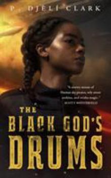 Paperback The Black God's Drums Book