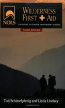 Paperback Nols Wilderness First Aid (Nols Library) Book