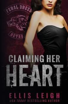 Paperback Claiming Her Heart: A Feral Breed Novel Book