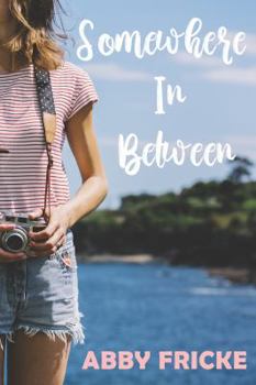 Paperback Somewhere In Between: Seeing life through a camera doesn’t mean that everything is picture-perfect, but every picture does tell a story. Book