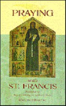 Paperback Praying with St. Francis Book
