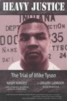 Paperback Heavy Justice: The Trial of Mike Tyson Book