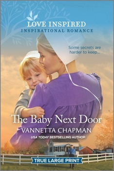 Paperback The Baby Next Door [Large Print] Book